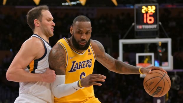 Jan 17, 2022; Los Angeles, California, USA; Utah Jazz forward Bojan Bogdanovic (44) guards Los Angeles Lakers forward LeBron James (6) in the first half of the game at Crypto.com Arena. Mandatory Credit: Jayne Kamin-Oncea-USA TODAY Sports